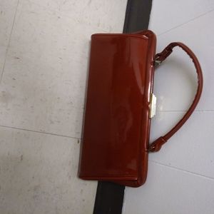 Red leather clutch